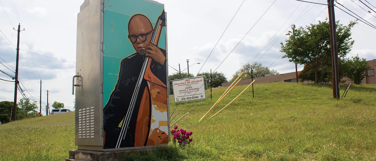 Landscape image of Truth's mural of Draylen Mason on side of electrical box in East Austin, TX.